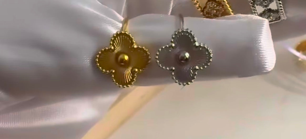 Clover leaf rings ( one size fit all )